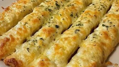 Cheese-Loaded Garlic Breadsticks FB IMG 1766100350978